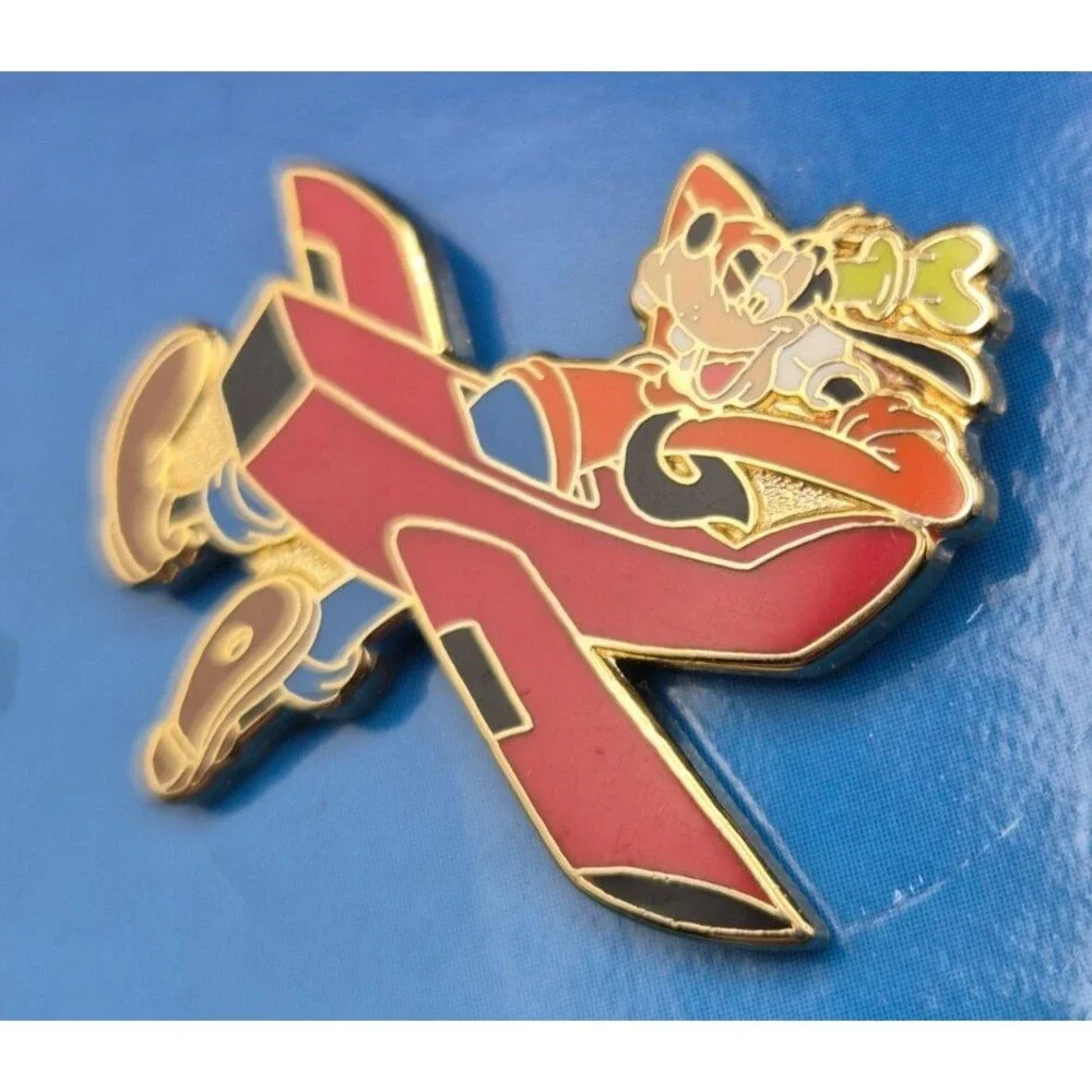 Vintage Walt Disney Travel Company Promotional Pin Goofy in a Red Airplane 2004